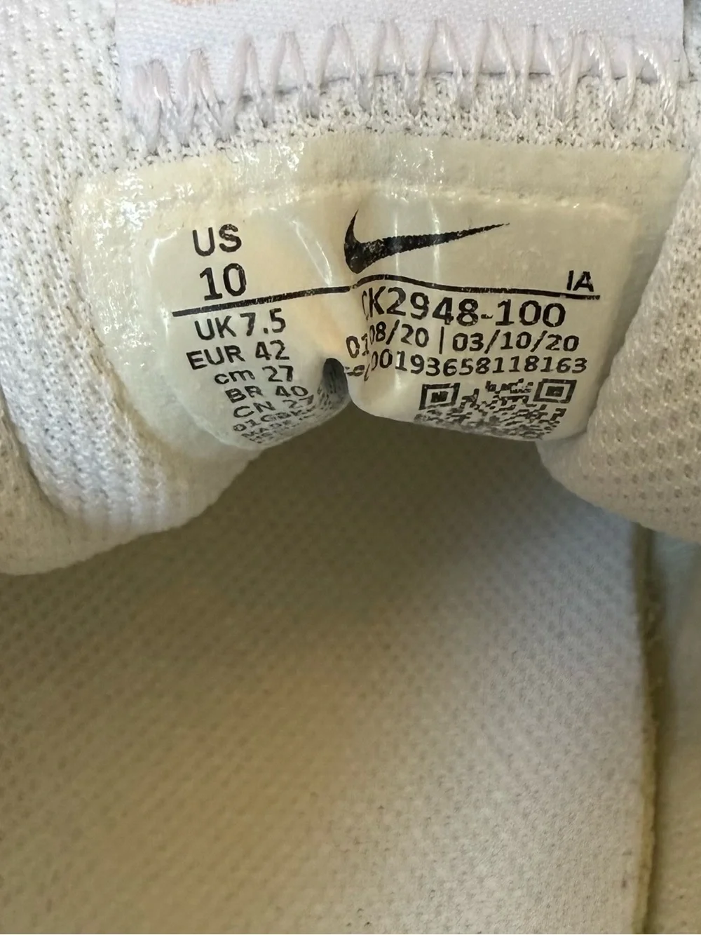 Nike Women’s White Sneakers with Pink Swoosh